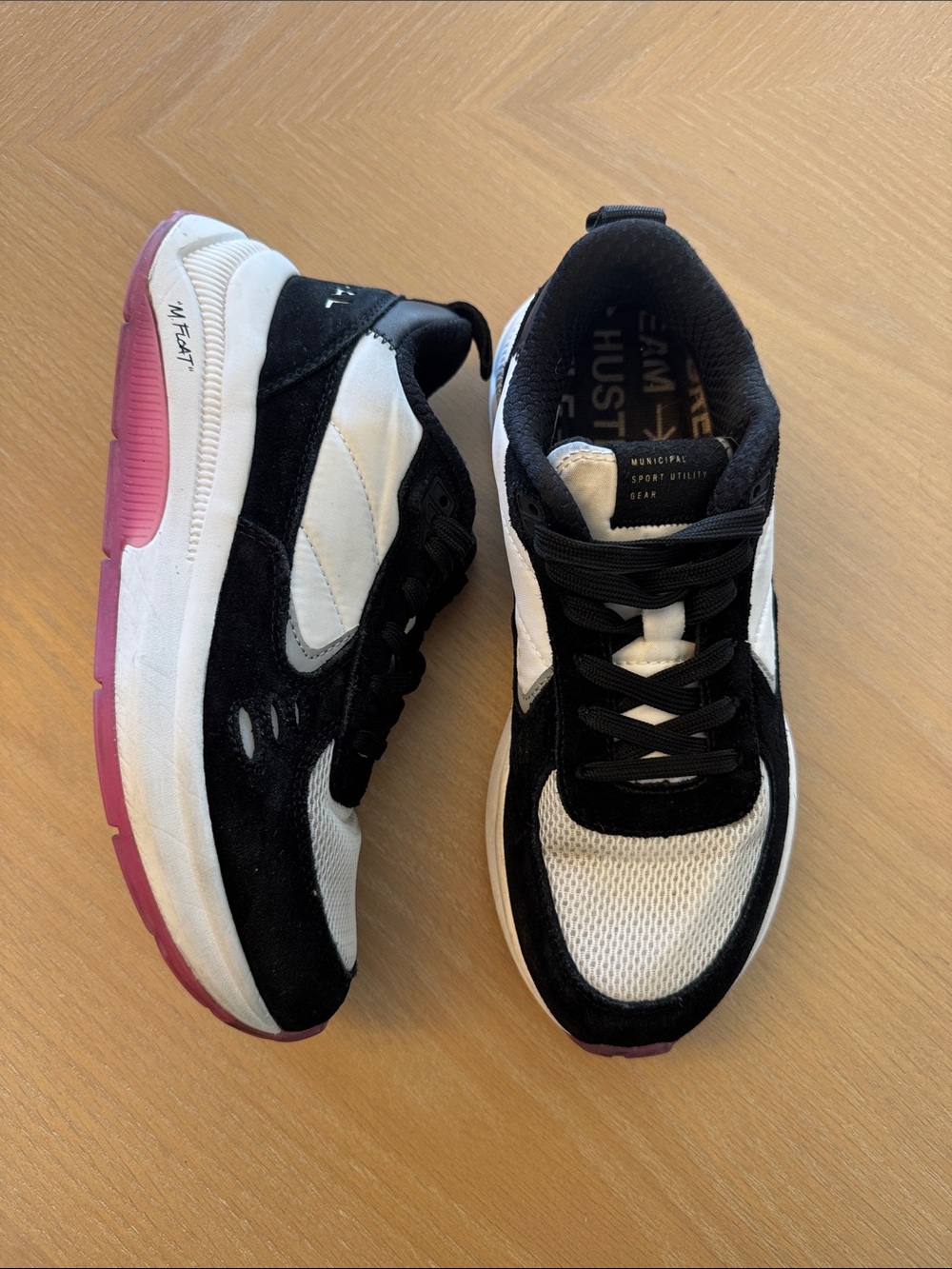 Municipal Women's Black and White Sneakers with Pink Sole Accent